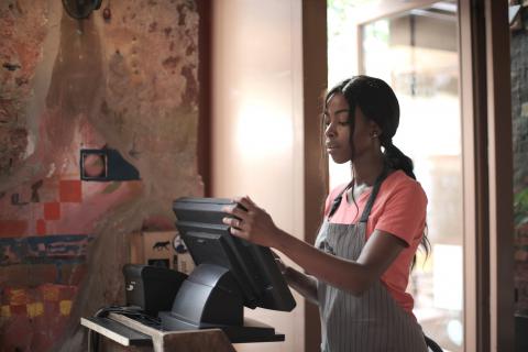 woman-working-as-a-cashier-3801439